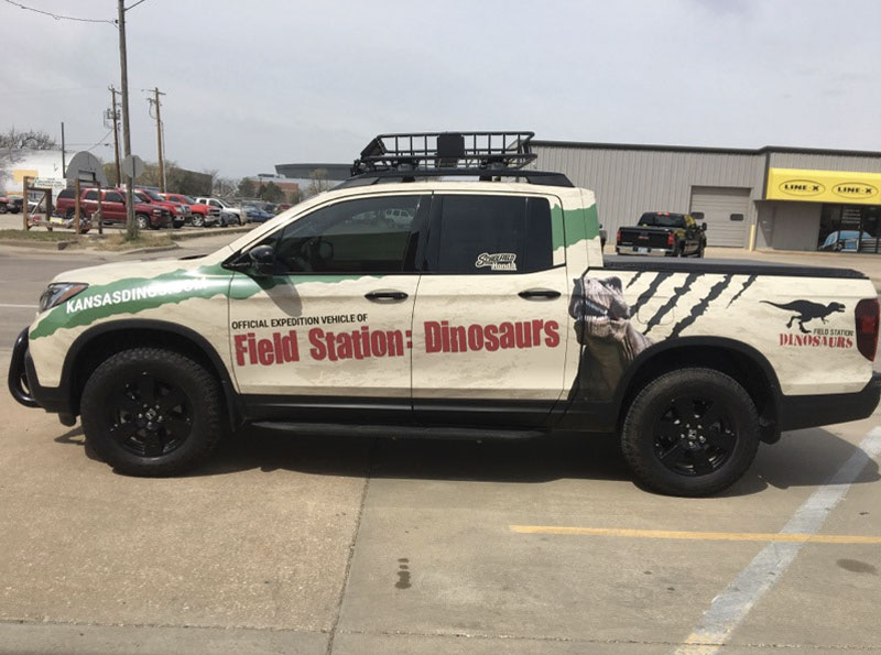 Dinosaur-Themed Vehicle Graphic